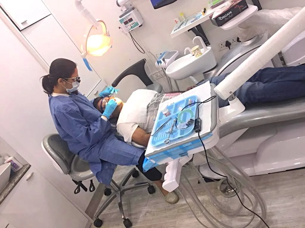 Dr. Amruta Godbole, best dentist in Khar West, Mumbai, treating a patient at Toothfully Yours Dental Clinic